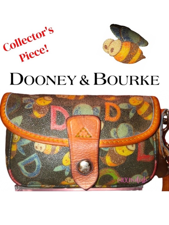Dooney & Bourke Handbags - 🐝 Dooney & Bourke Limited Edition Vintage Bumble Bee Wristlet Black Heart Charm